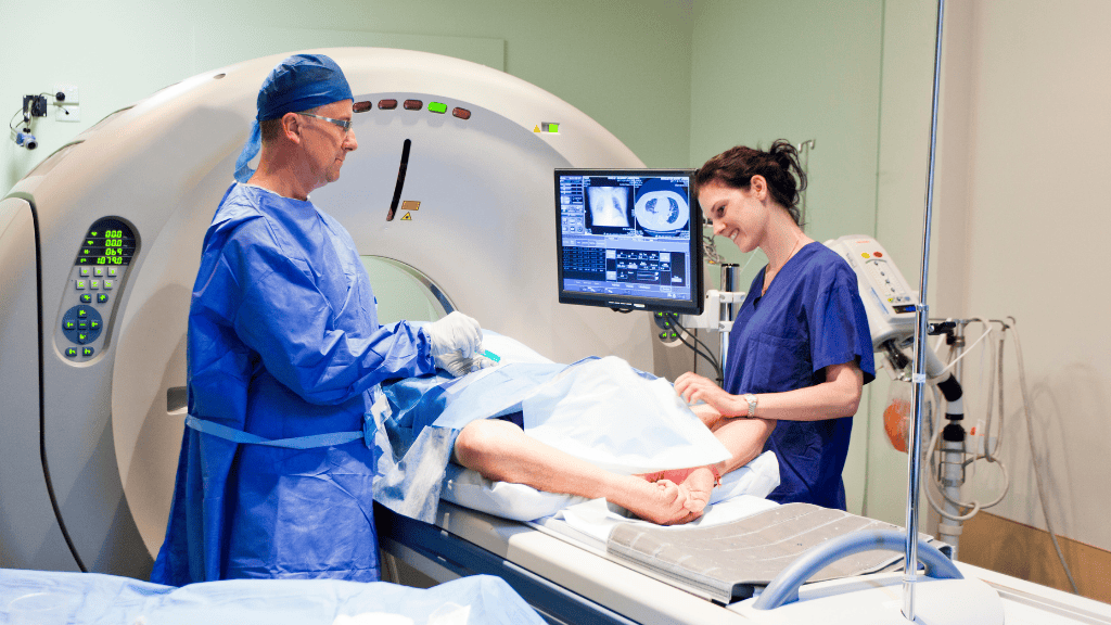 Patient undergoing MRI scan in a Barcelona hospital with doctors assisting during advanced diagnostic procedure