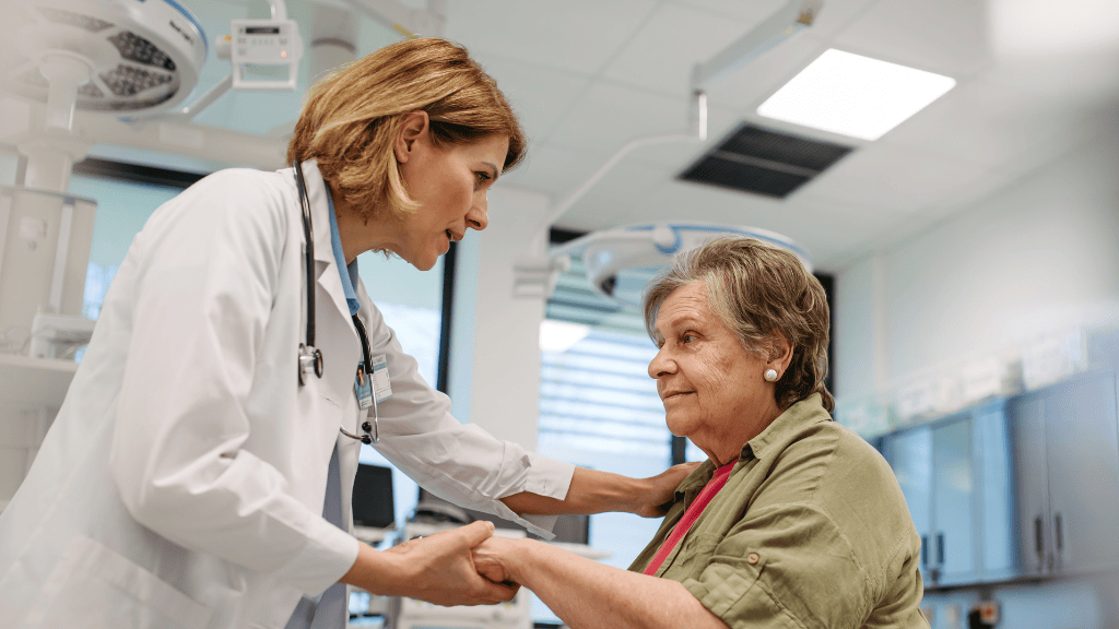 Doctor providing medical care to an elderly woman as part of advanced Alzheimer treatment